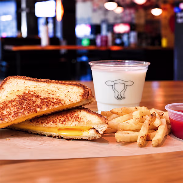 Grilled Cheese on Texas Toast, served with hand-cut fries, ketchup & your choice of kid's drink..