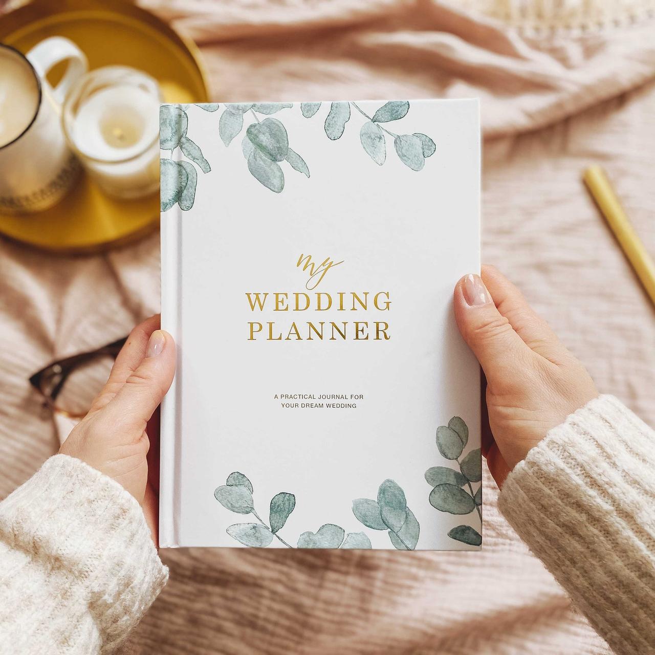 etsy blush and gold invites white luxury wedding planner book with green leaf print and gold lettering 