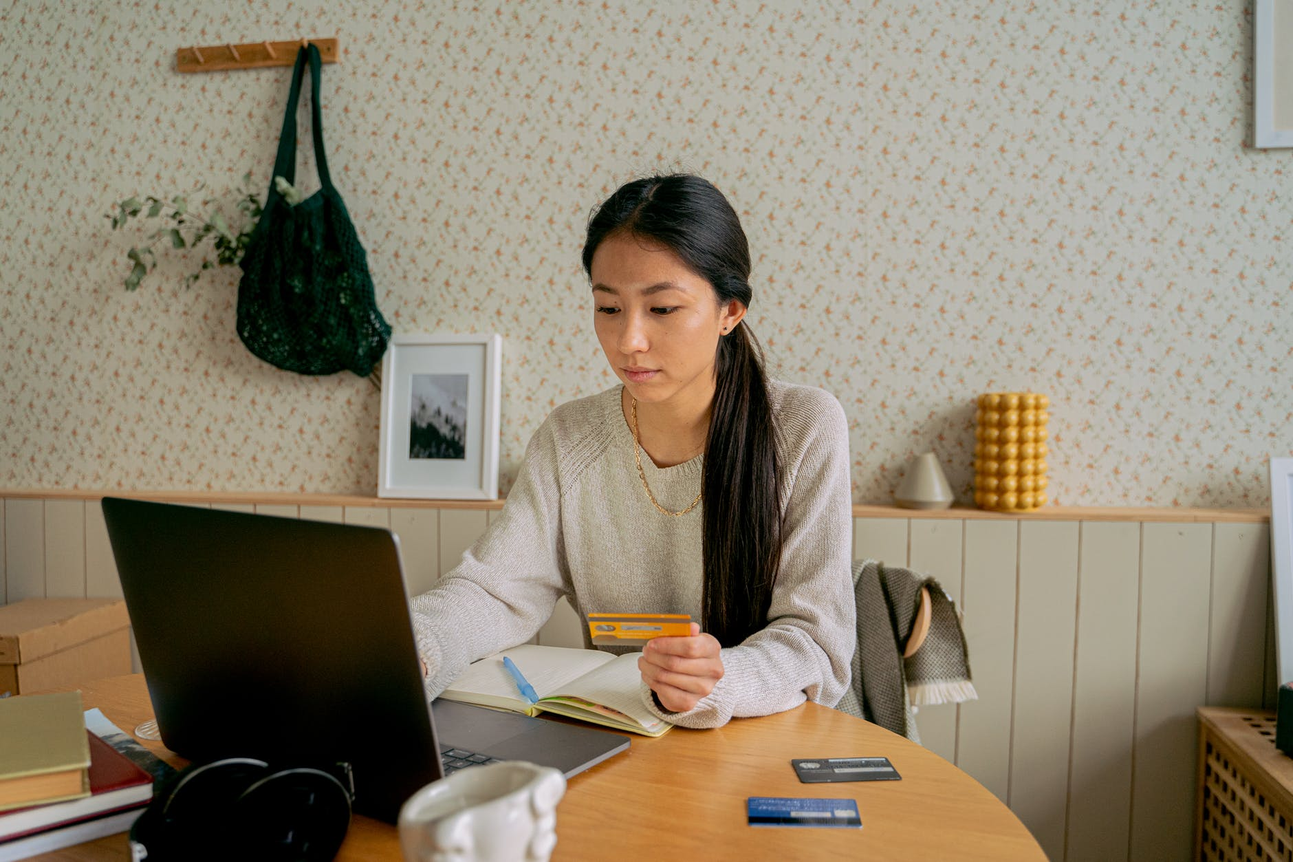 woman paying for products online using credit card
