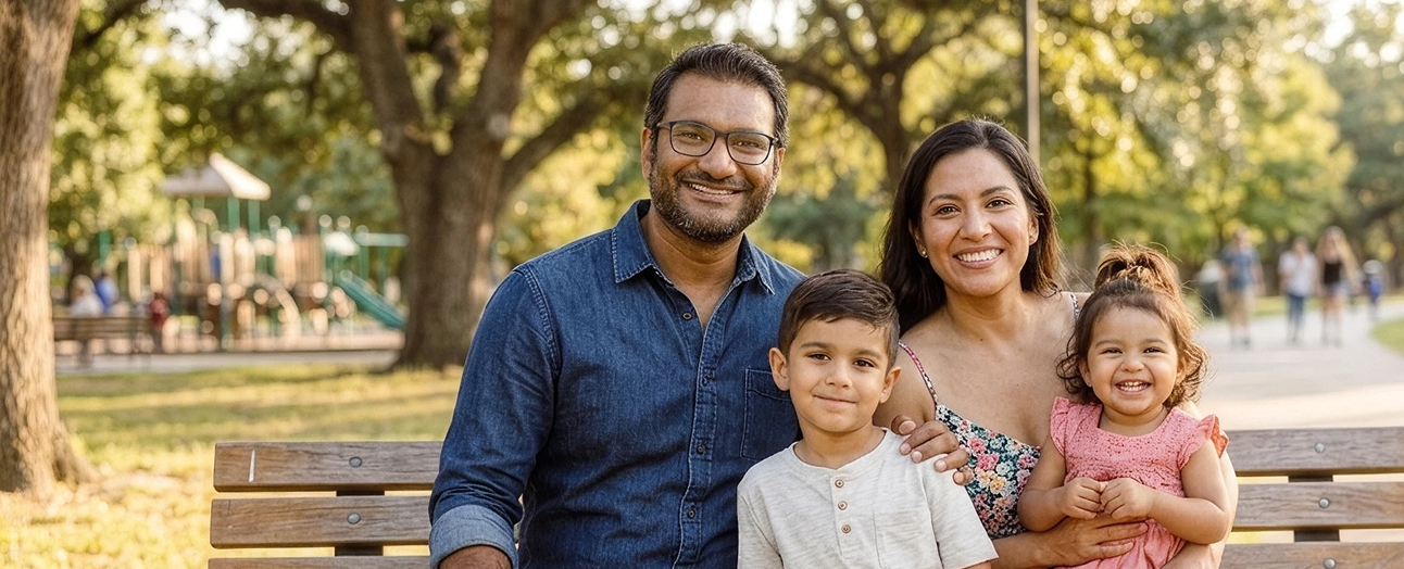 A family sitting in the park