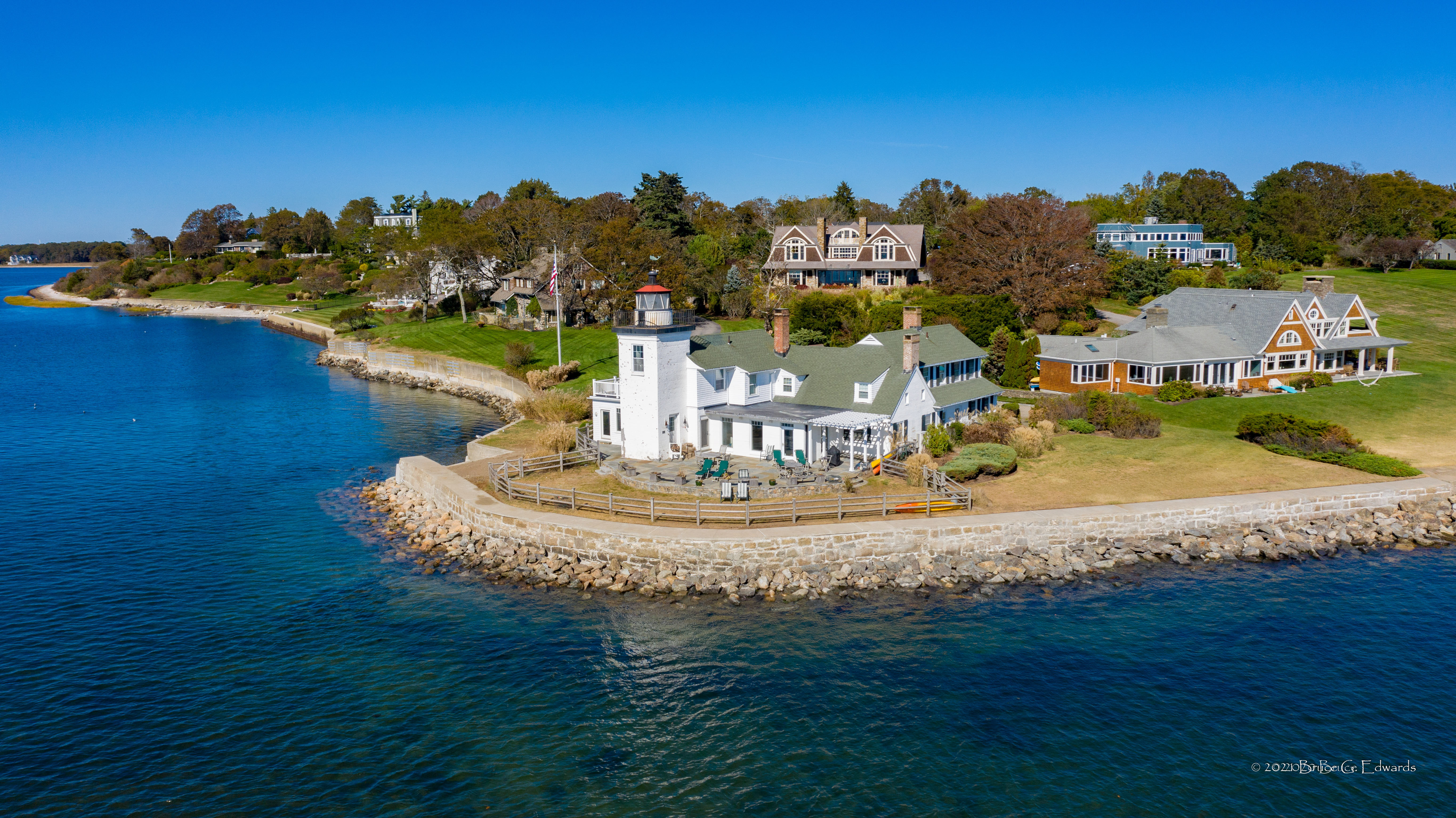 A significant OCC Seawall Project at the historically significant Nayatt Point Lighthouse, at Barrington, Rhode Island on the shore of Narragansett Bay.. This project included resetting large cut stone blocks in an 1865 seawall, pulling back and rebuilding a secondary stone revetment, and also renovating a concrete seawall. 