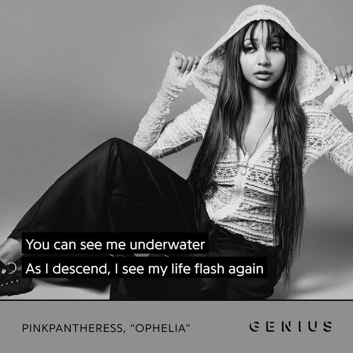 Singer Pink Pantheress n in a white lace top and black pants sits gracefully, with a quote from her song: You can see me underwater/ As I descend, I see my life flash again.