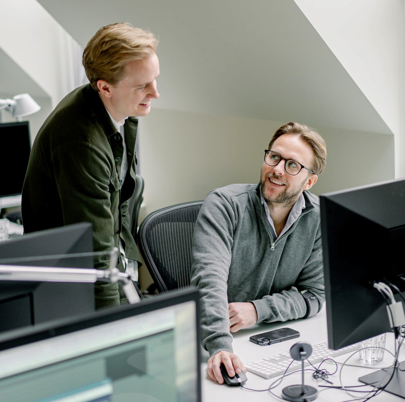Exelement colleagues working together in the office