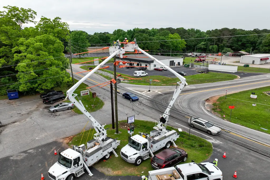 Photo of lift trucks captured from aerial footage during a video shoot for the Desoto Group.