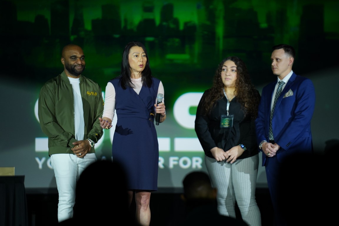 Group pictured onstage at SLS annual sales conference in Orlando, Florida.