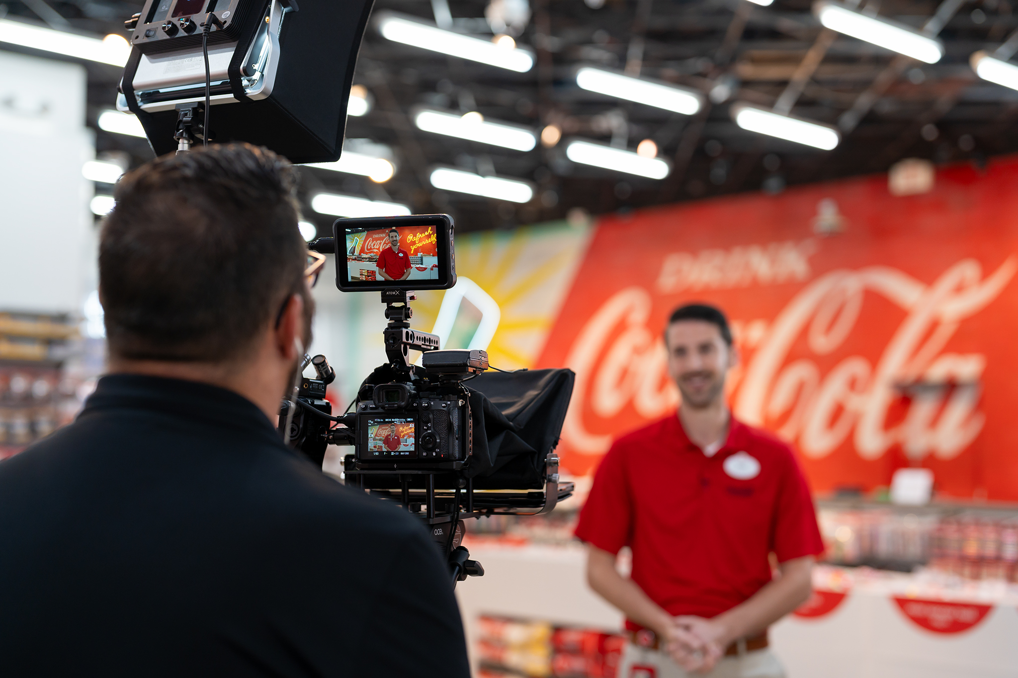 Studio Nine 13 partnering with Coca-Cola on a corporate video production project and filming an employee for a training video.