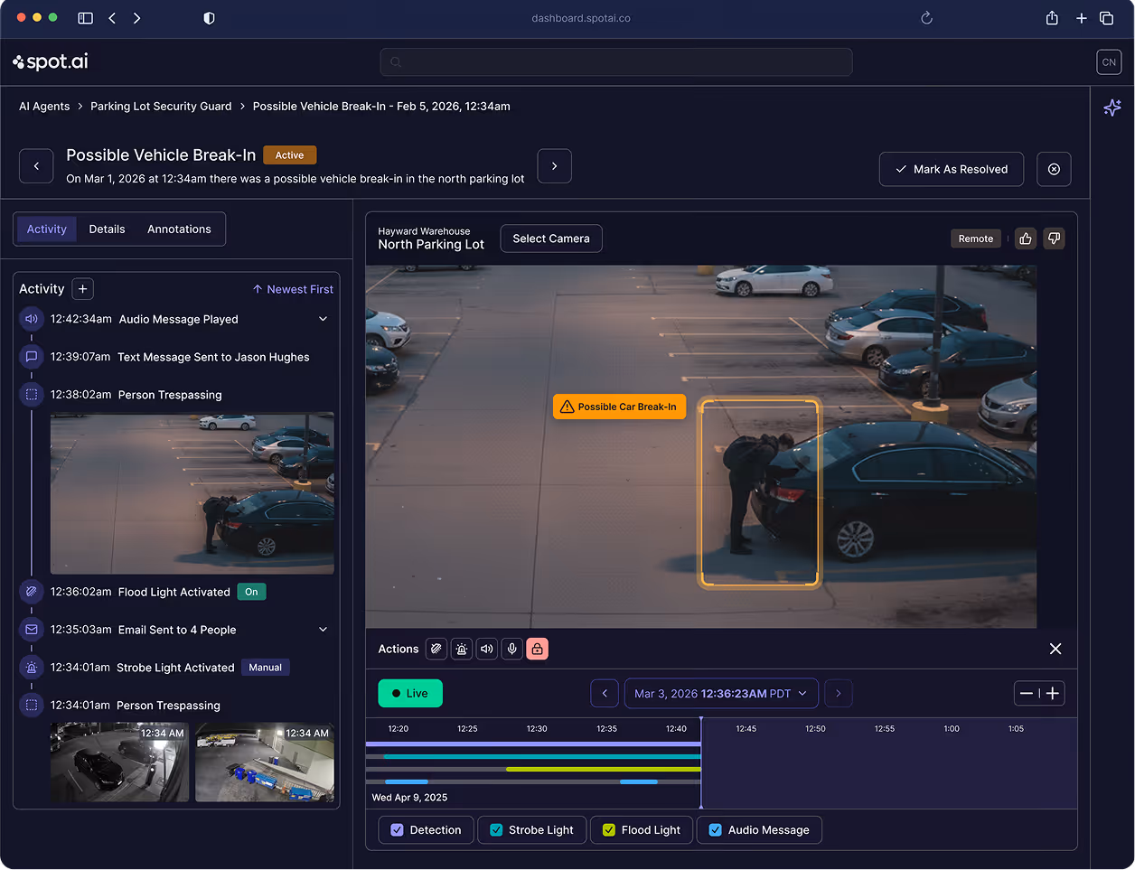 Security dashboard showing detected possible vehicle break-in with video of person tampering with a car trunk in a parking lot.