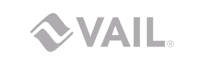 VAIL logo with a diamond-shaped design element on the left.