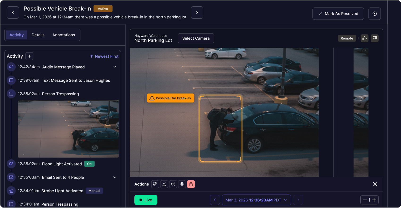 Security dashboard showing detected possible vehicle break-in with video of person tampering with a car trunk in a parking lot.