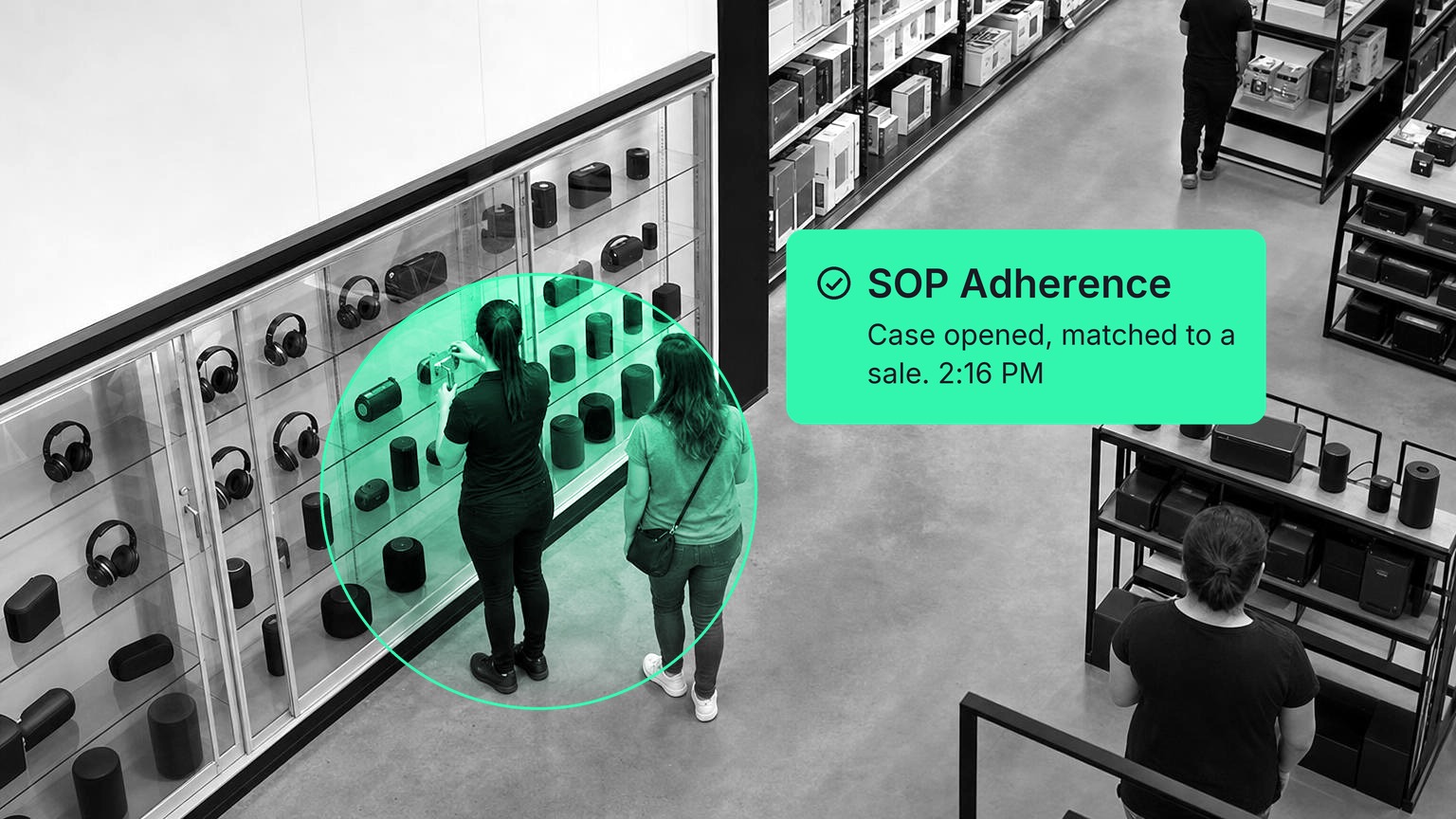 Store associate unlocking a glass showcase of headphones and speakers for a customer on the sales floor of an electronics store, in black and white with a Spot AI detection overlay.