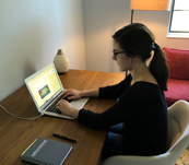 Lauren working at home