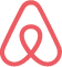 Airbnb logo consisting of a stylized red Bélo symbol.