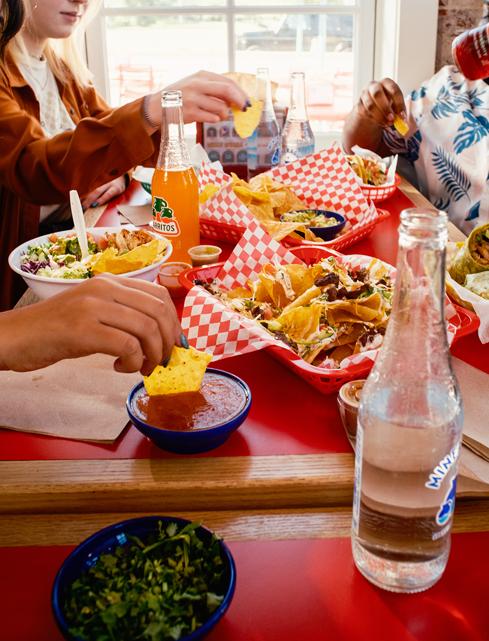 Tacos & Dips on Table at Tiki Taco