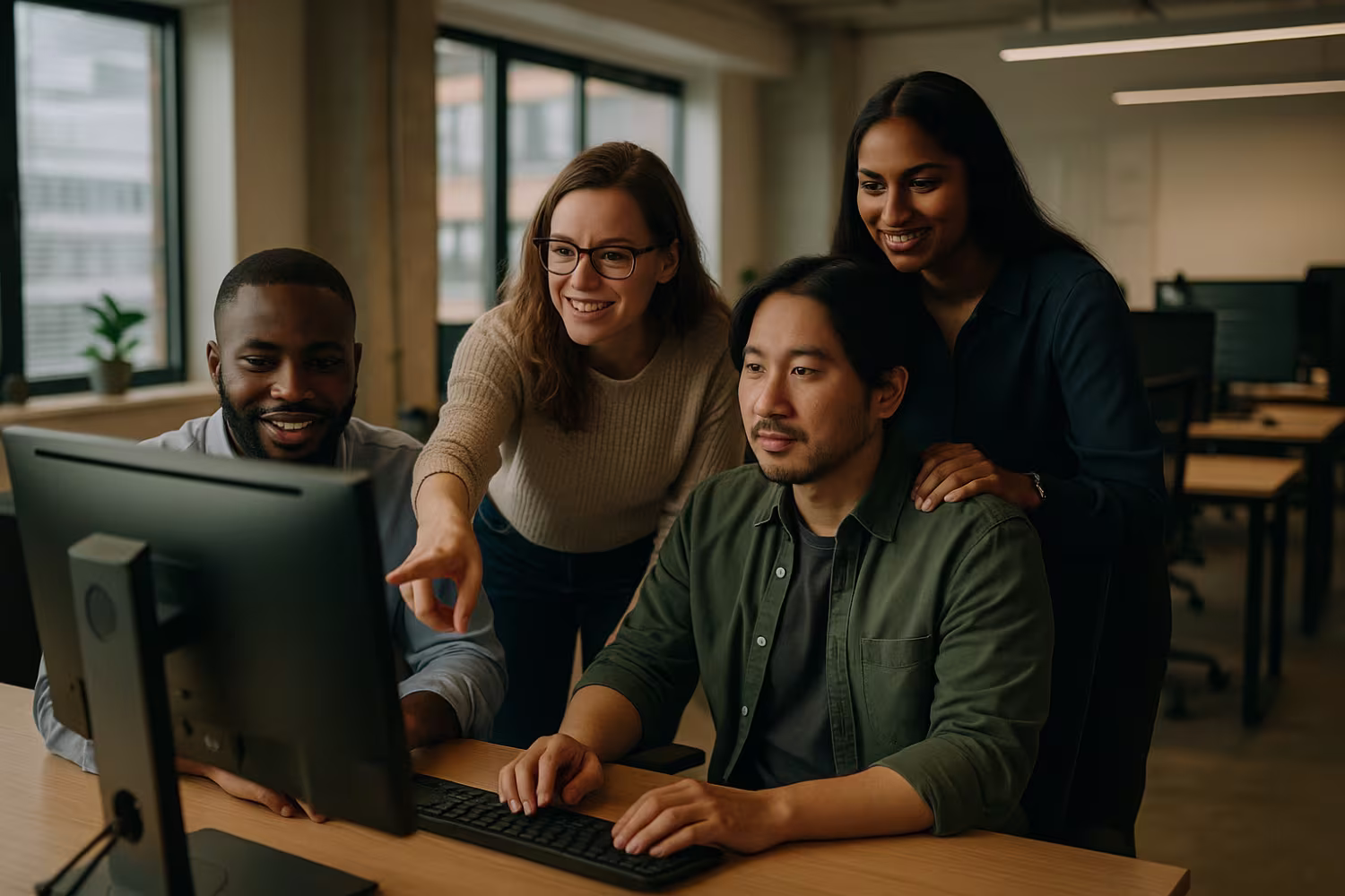 Diverse IT outsourcing team collaborating