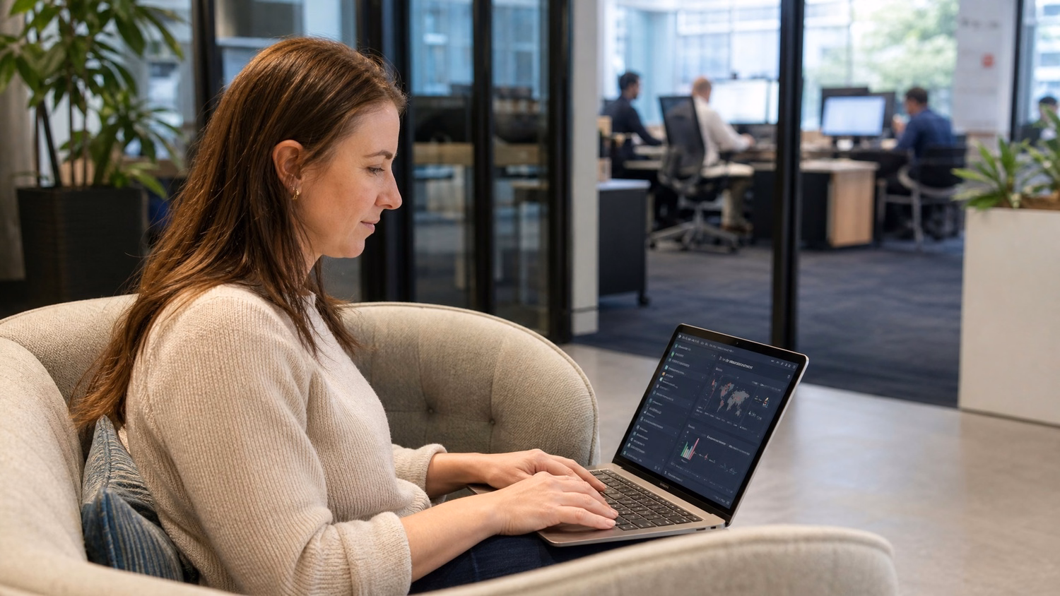 Woman configures network alerts on laptop in lounge 58