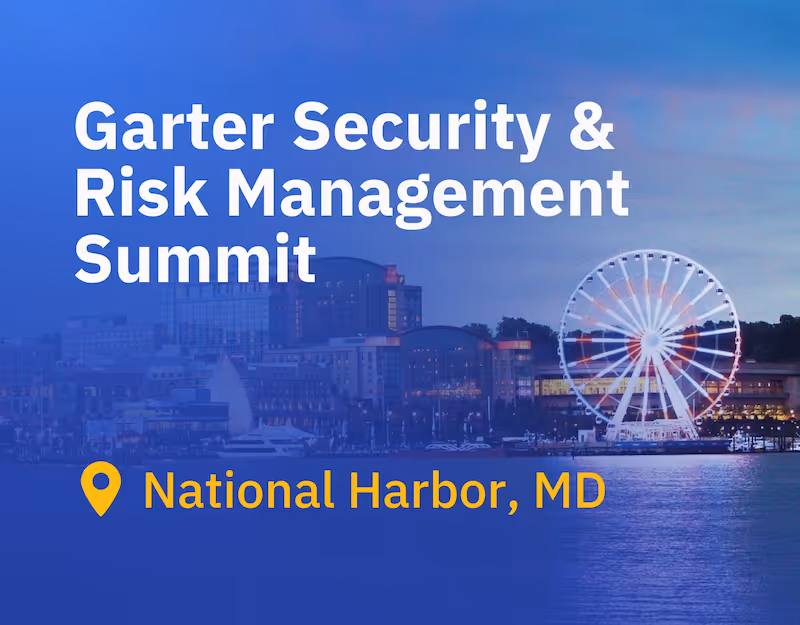 A promotional graphic for the Garter Security & Risk Management Summit in National Harbor, MD, featuring a blue-tinted twilight view of the waterfront and a large Ferris wheel.