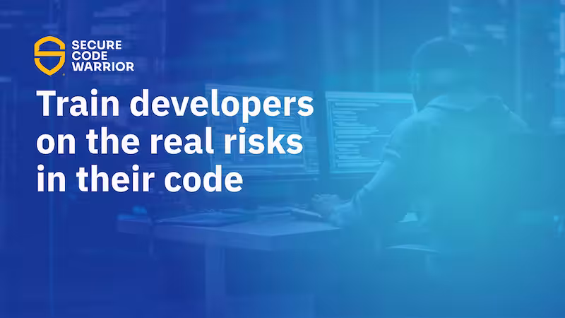 Secure Code Warrior blog banner with a blue overlay over a developer working at a multi-monitor desk displaying code, alongside the headline 'Train developers on the real risks in their code.'