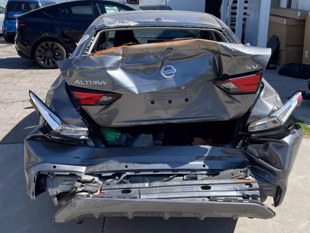 Nissan Altima rear end damage
