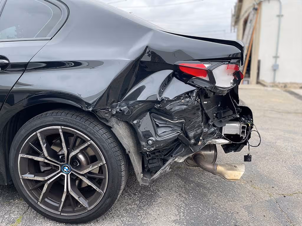 BMW rear end and quarter panel collision damages