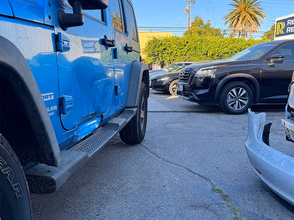 Jeep Wrangler left side collision damage