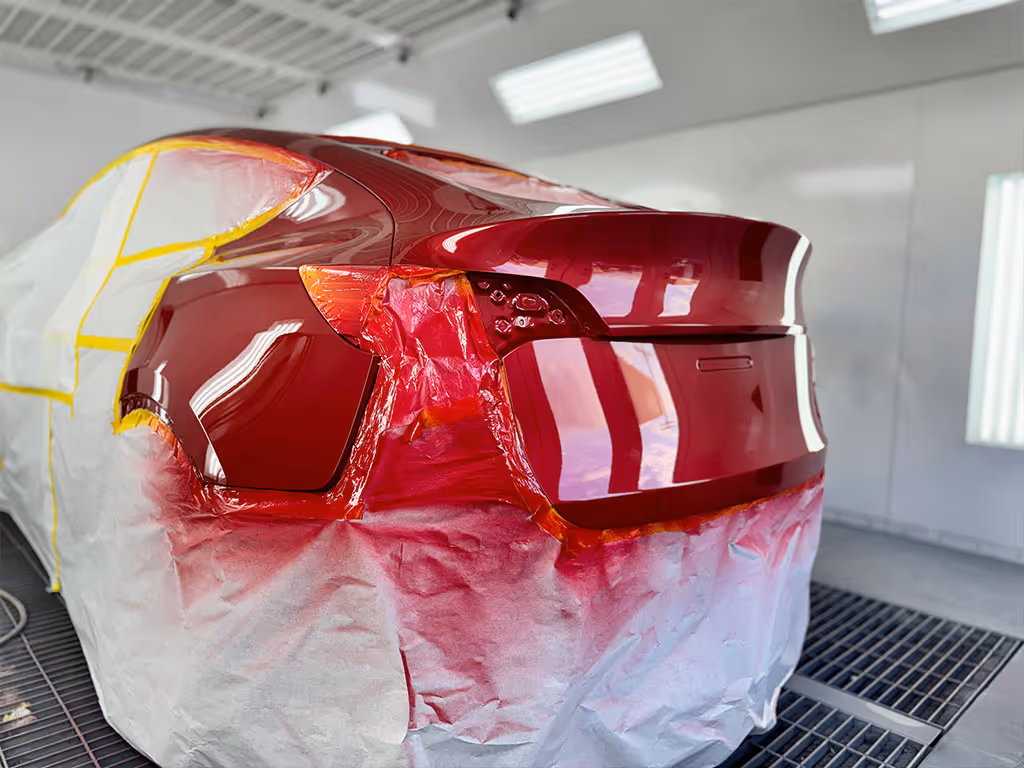 Tesla model y in spraybooth getting a paint job