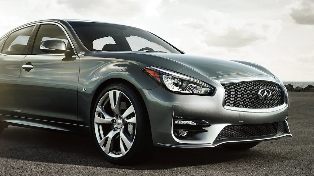Gray Infiniti Q70 luxury sedan, front three-quarter view