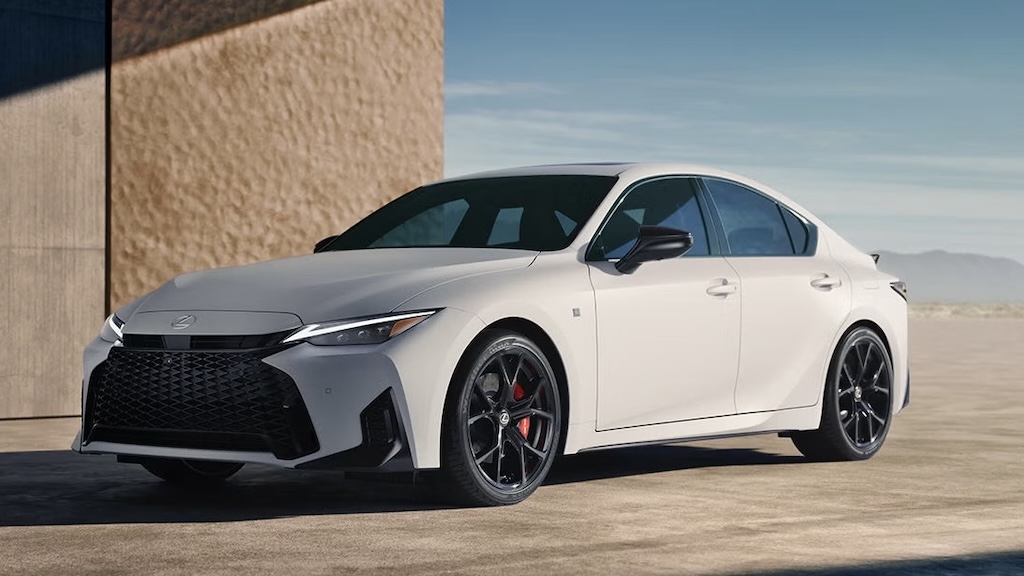 White Lexus IS sport sedan with black wheels