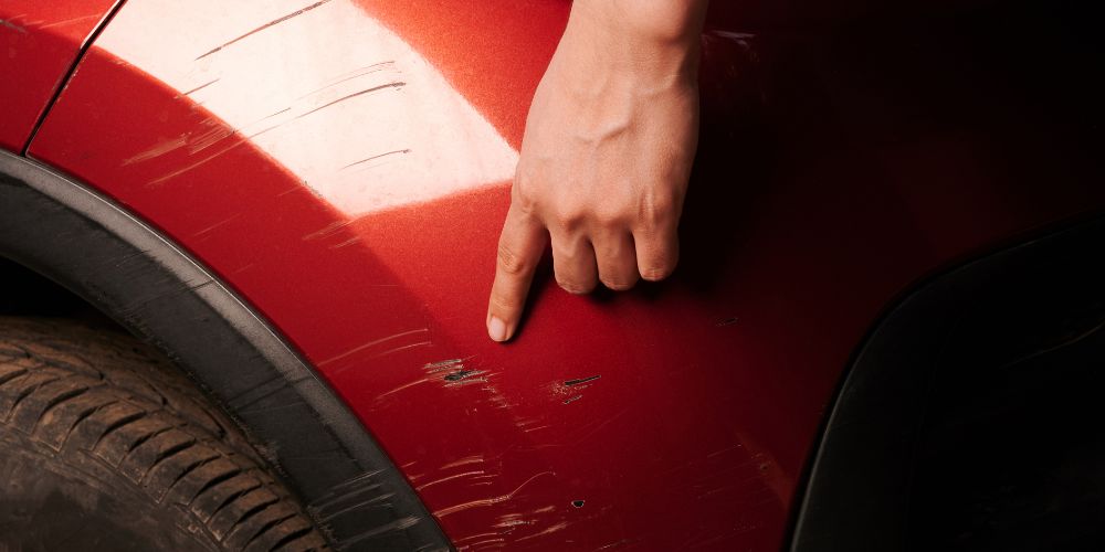 Do auto body shops fix scratches?