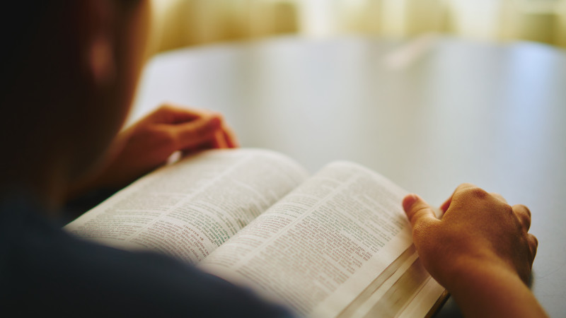 Man reading the Word of God