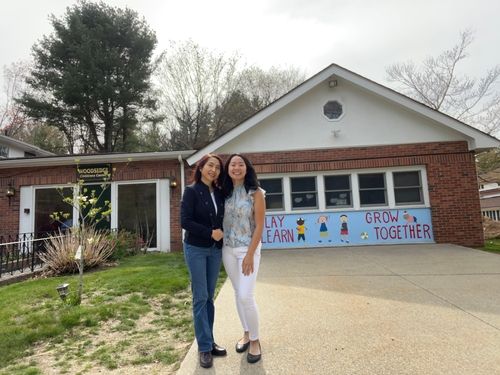 Founder Abbey Mui standing with her mother in front of WoodsEdge Children's Center.