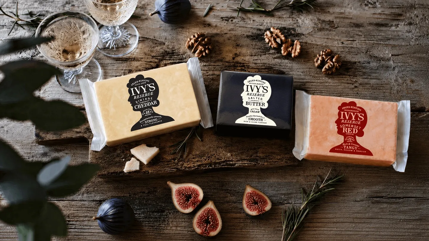 Ivy’s Reserve cheddar packs and serving board on a dark table