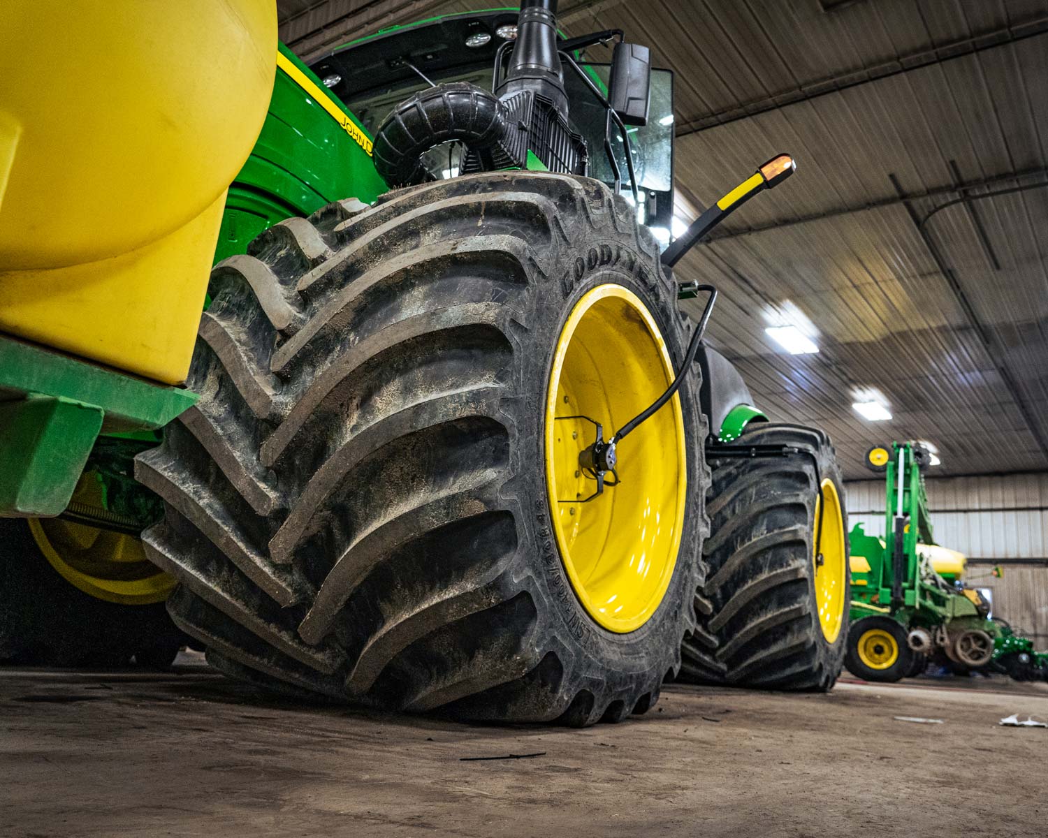 A central tire inflation system like the one installed on this John Deere 4WD tractor improves fuel efficiency on both the road and in the field.