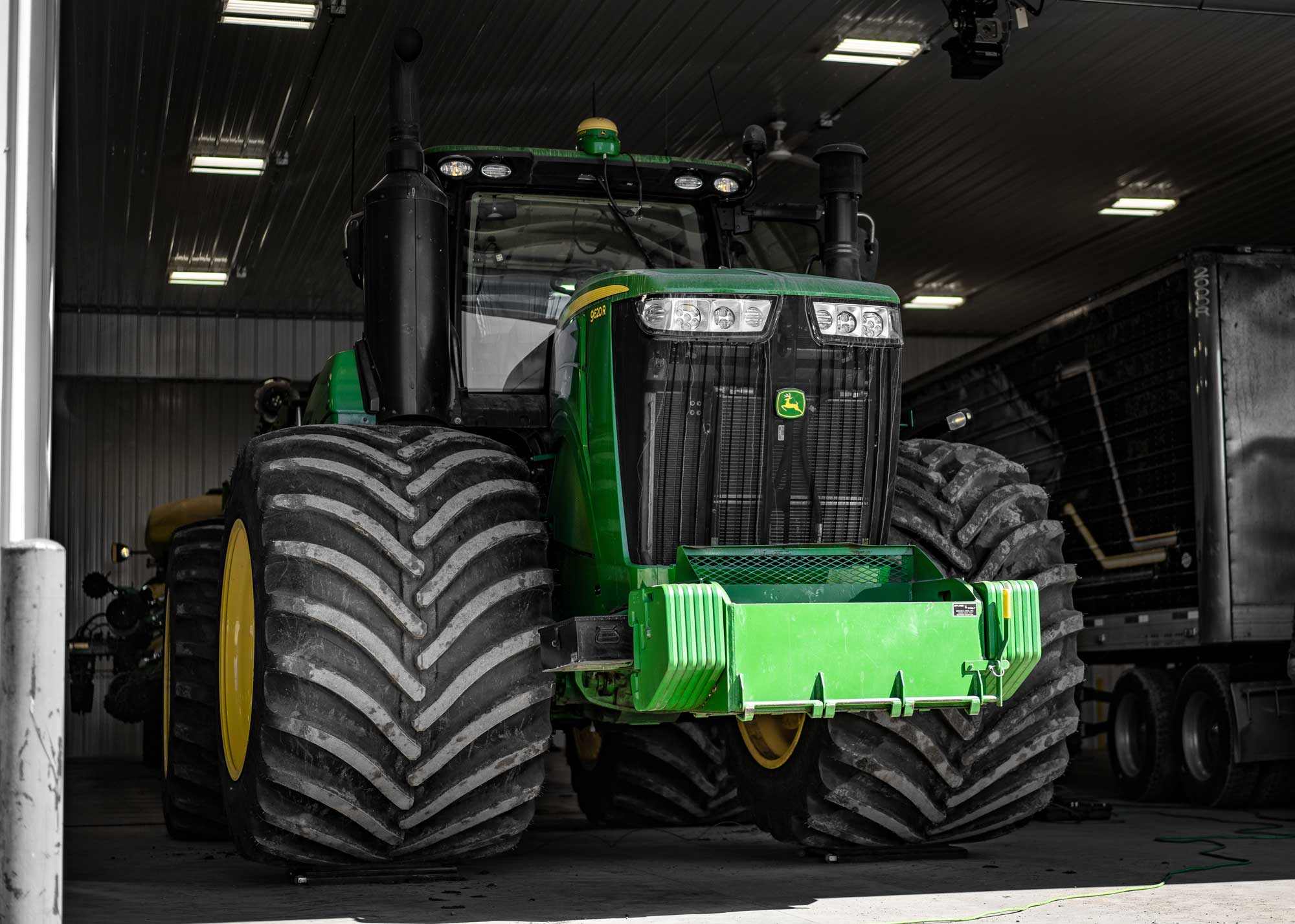 A John Deere 9620R 4WD tractor with Goodyear LSW1400/30R46 super single tires