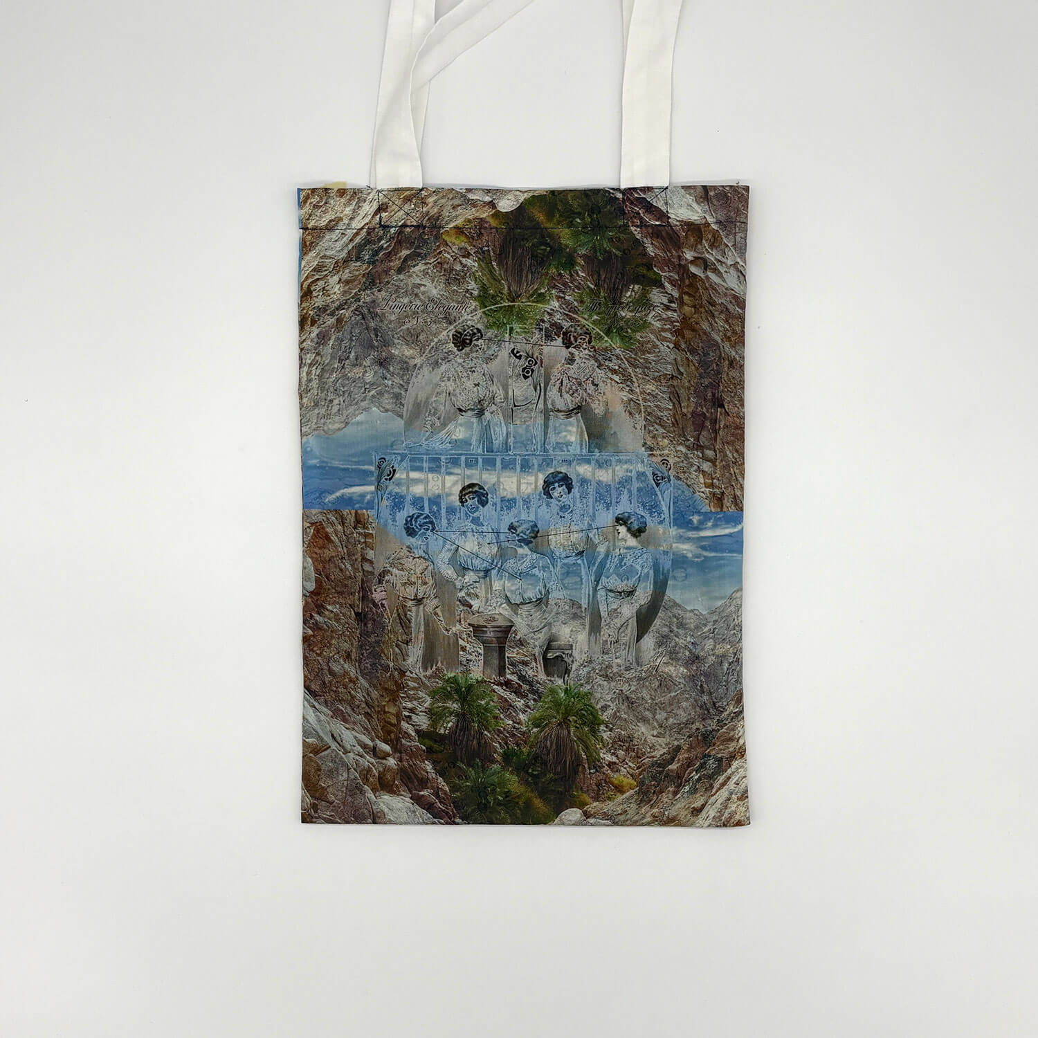 A studio photo of a designer bag and a publication printed on textile