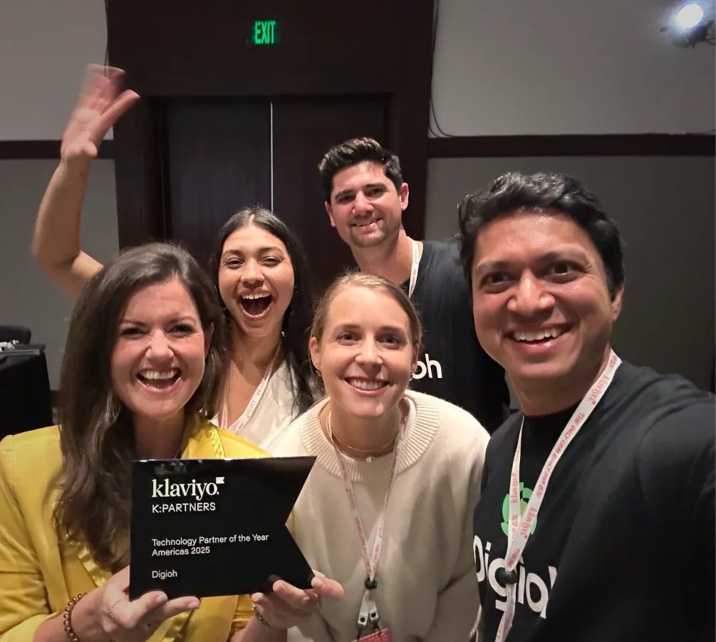Digioh team accepting Klaviyo partner of the year award