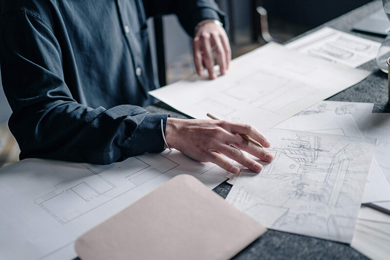 Architect drawings spread on a table