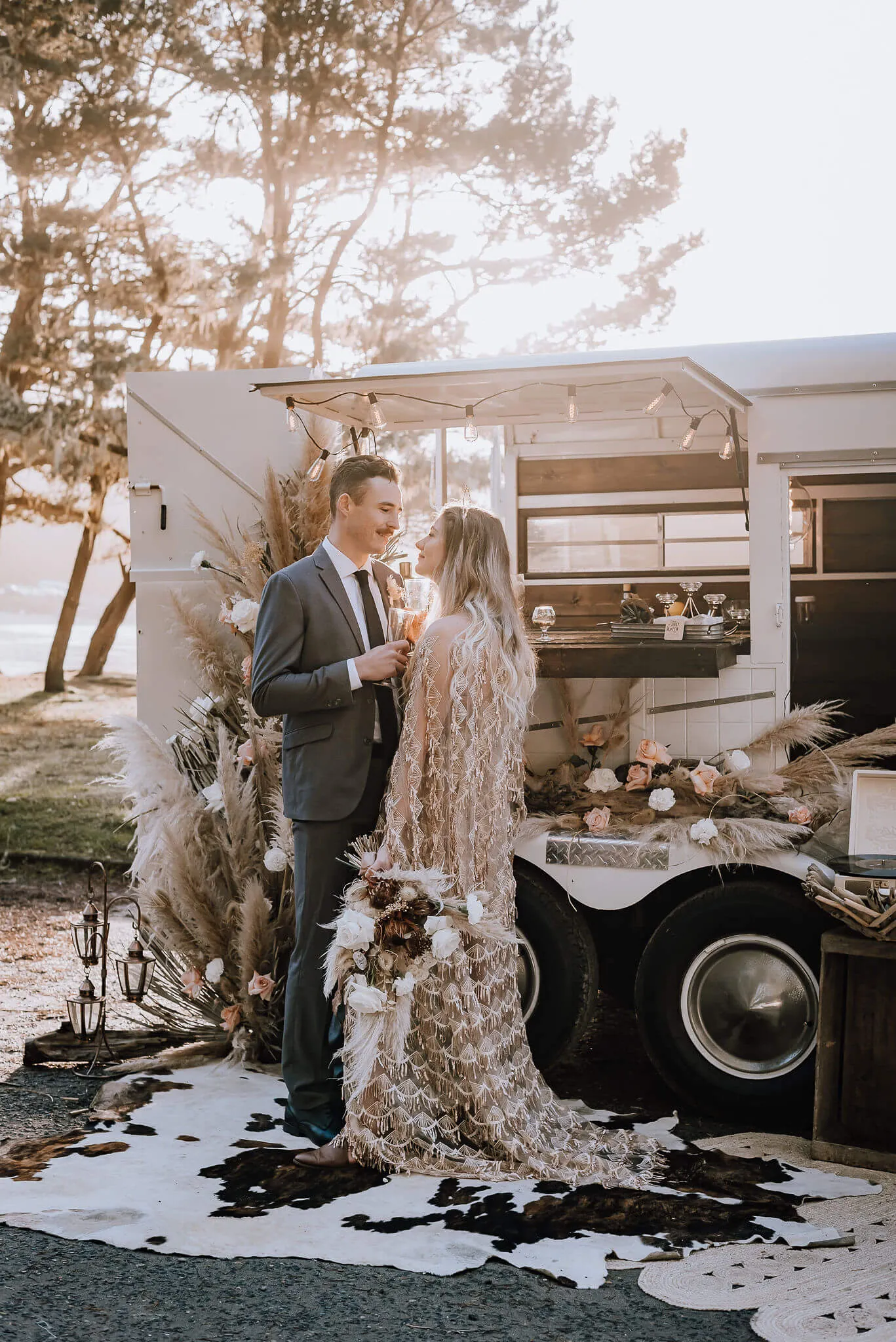 Happy couple enjoying drinks from The Tipsy Willow