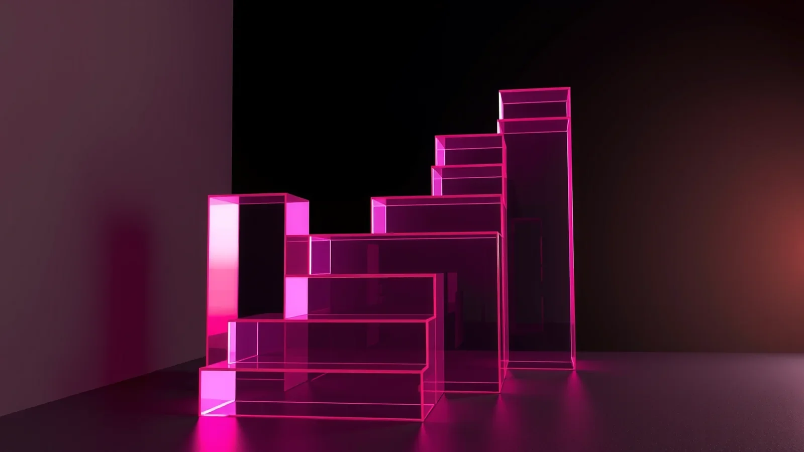 Translucent hot pink glass blocks stepping upwards against a dark background.