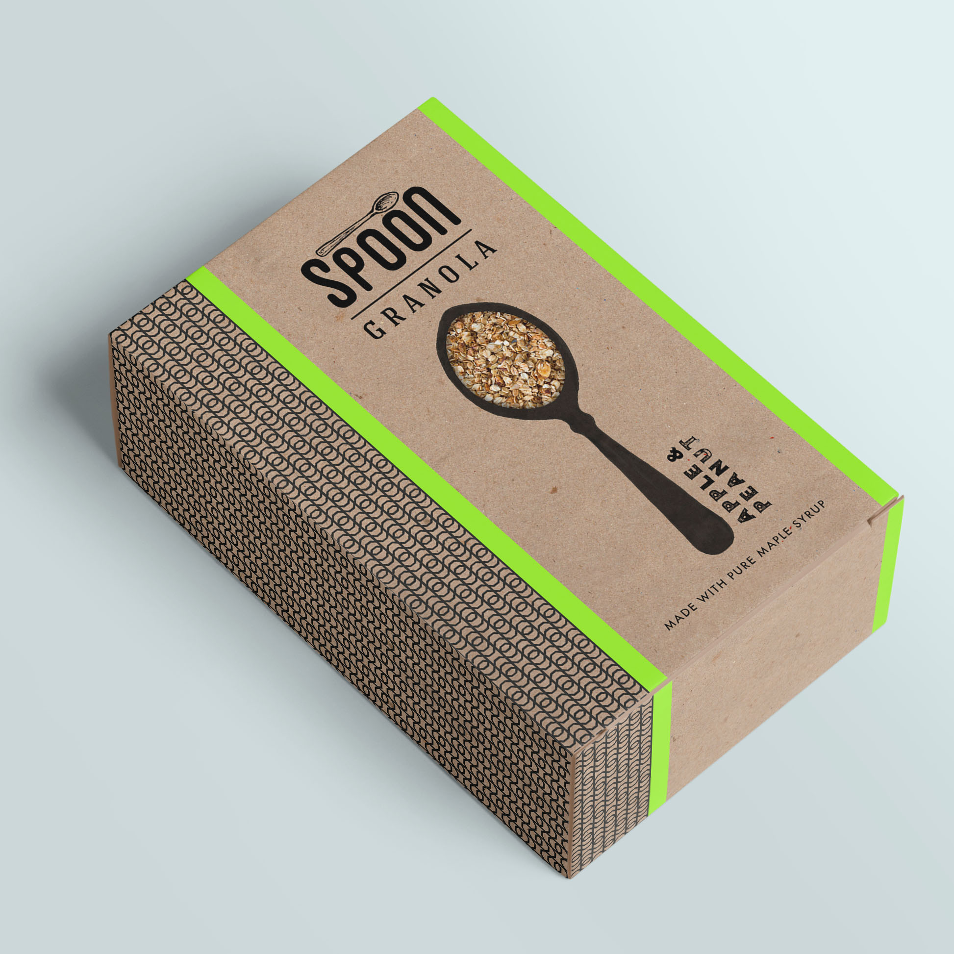 Spoon Granola apple & peanut flavour box on a surface, with kraft background, geometric pattern, neon green accents, hand-drawn spoon detail with cut-out window.