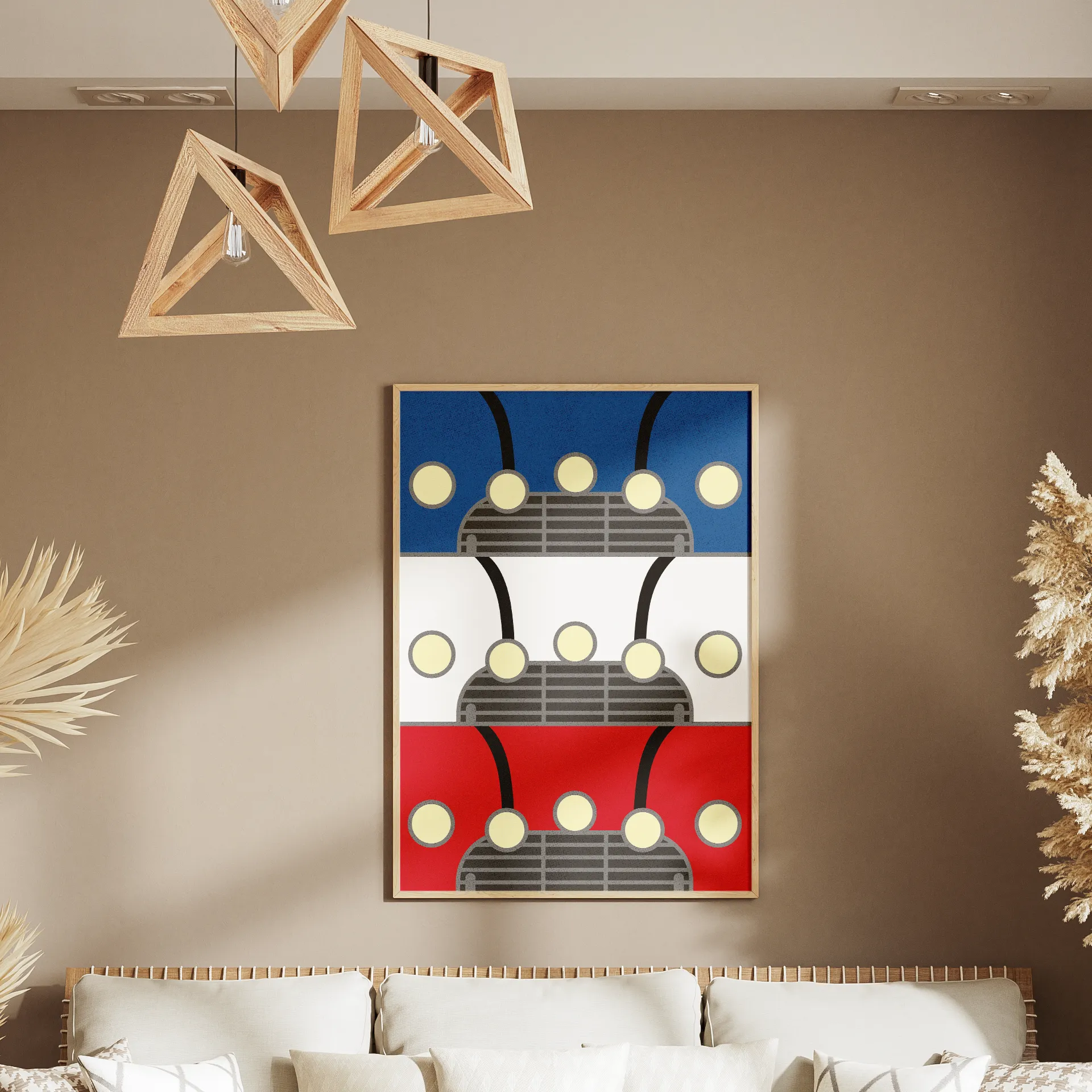 Framed poster on the wall of a bohemian-style room, showing a flat illustration of the fronts of three Minis in blue, white, and red, stacked vertically.