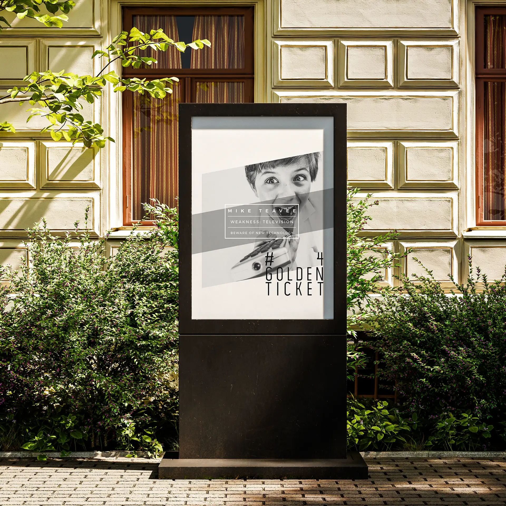 Black Poster stand featuring a boy representing Mike Teavee holding a TV remote with a wacky expression in black and white, with character details in a sans serif font in a central text box, set among shrubbery near a library building.