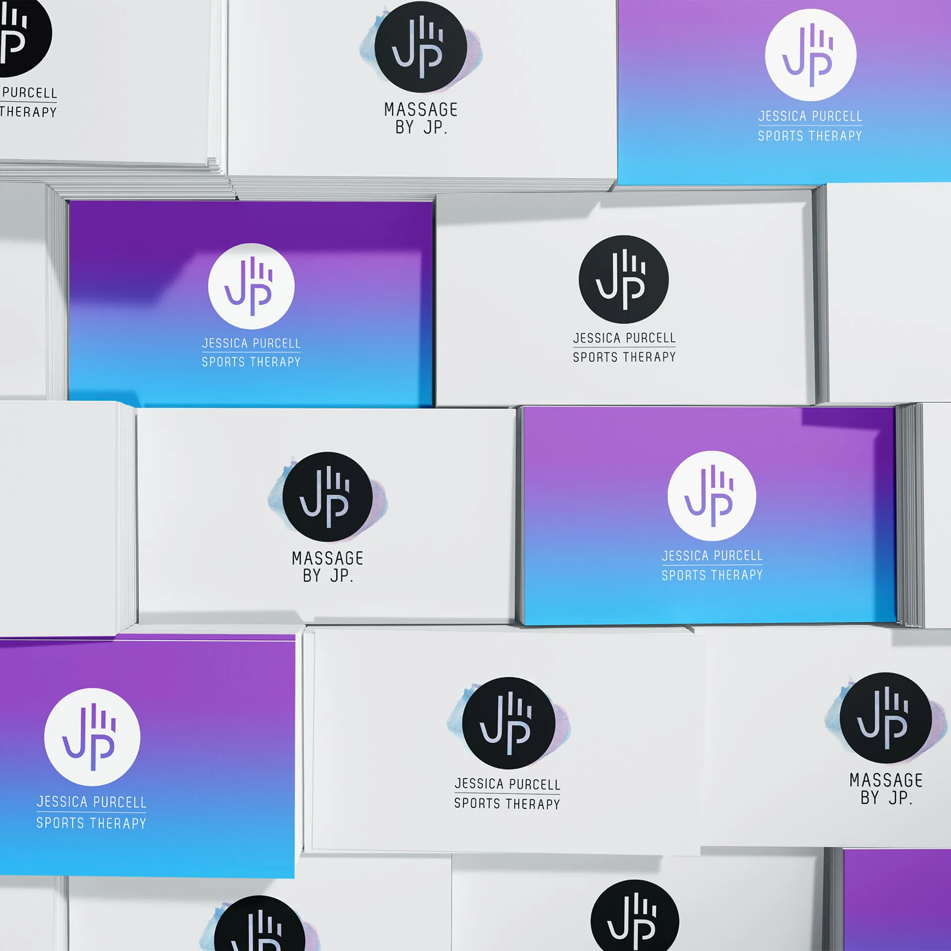 Stacks of business cards showing variations of the Jessica Purcell Sports Therapy abstract hand logo: plain black, white on a purple and blue gradient, and black over a blue and purple watercolour texture.