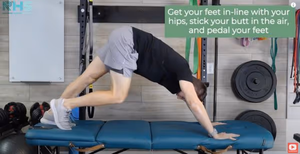 Downward dog exercise with emphasis on nerve glide