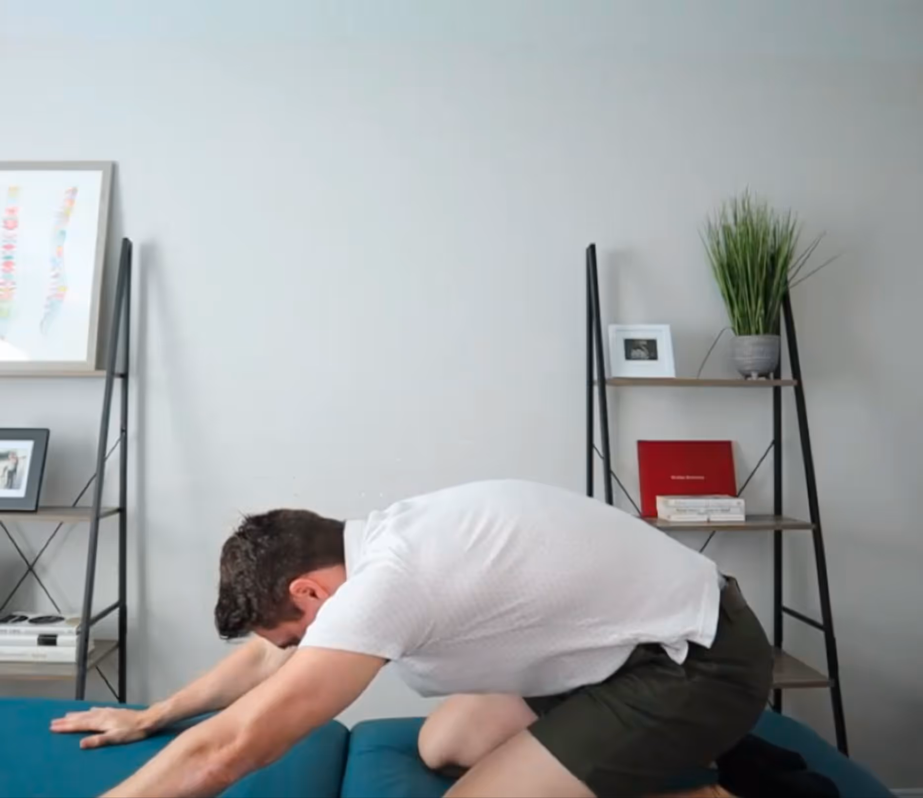 Prayer Stretch or Child's Pose with Posterior Pelvic Tilt End of Range