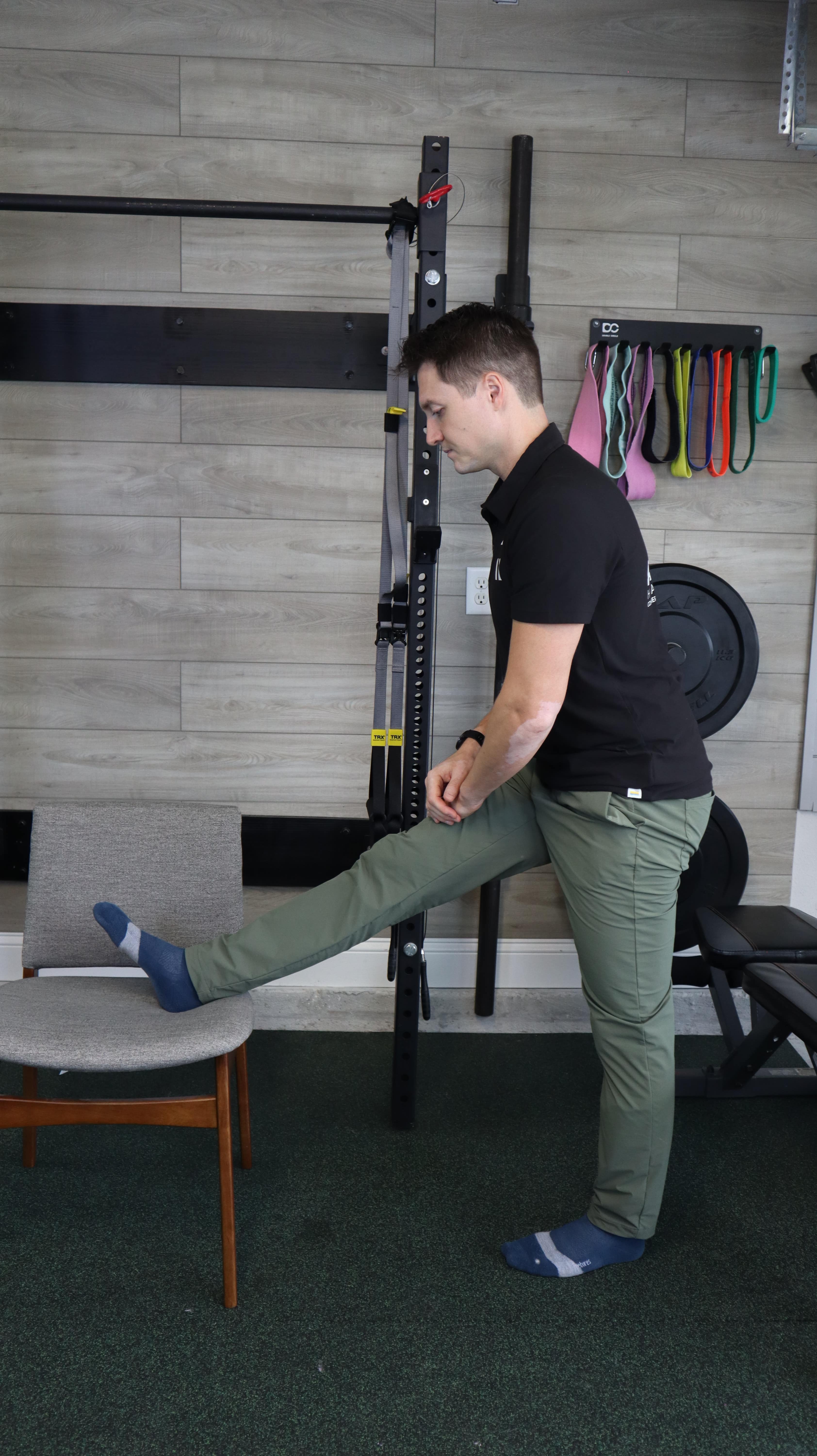 Man doing Hamstring Test with Chair