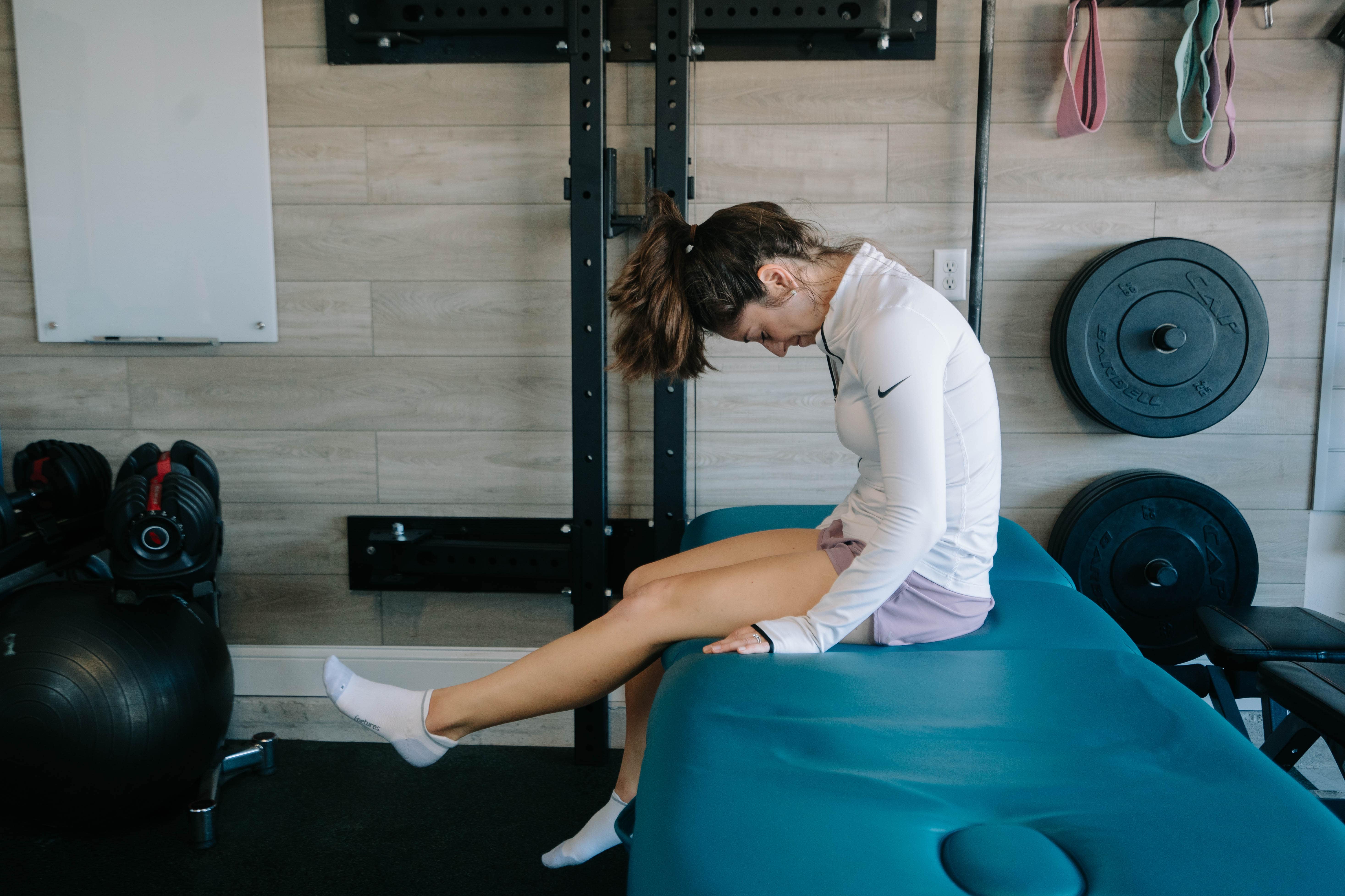 Women doing the Slump Test with foot points and shoulders rounded