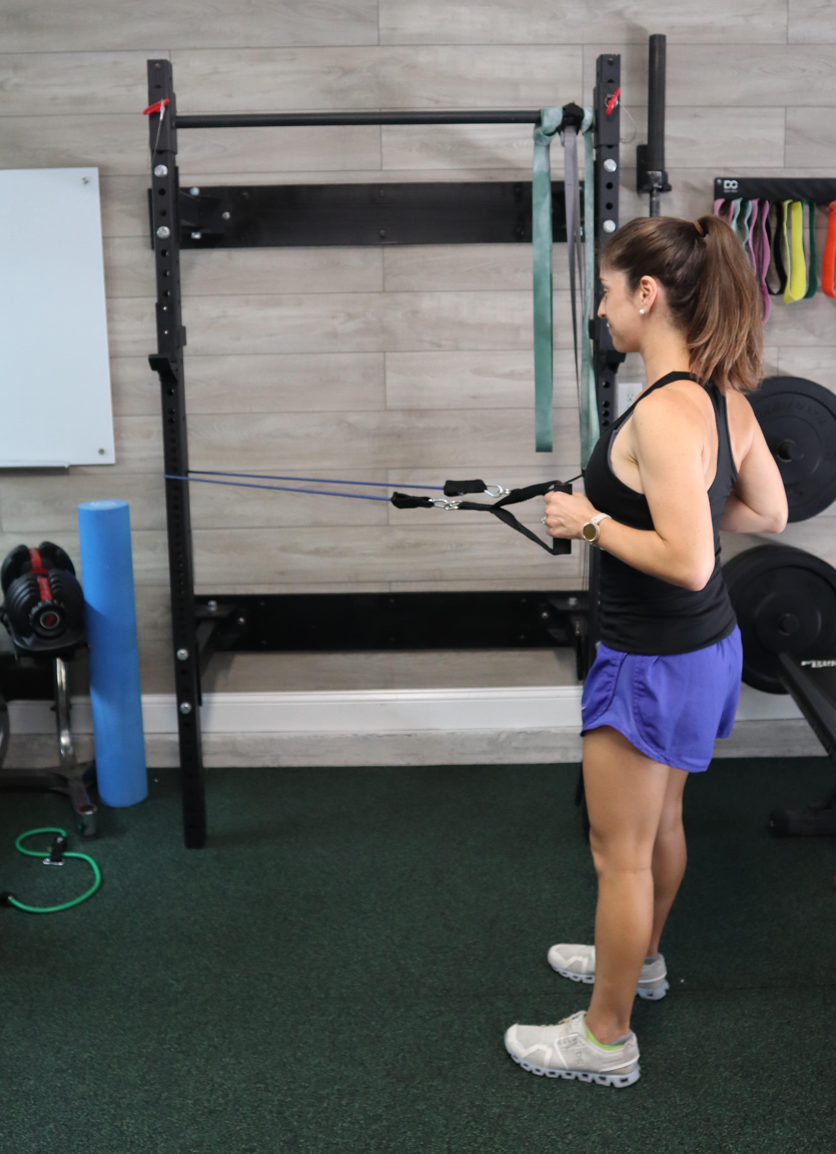 Women showing the Standing Banded Row for core stability