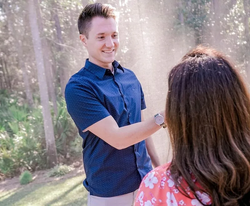 Dr. Michael Derry talking with a patient outdoors during an in-home visit