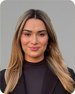 Headshot photo of Ariel Savage.