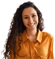 A woman smiling confidently, exuding positivity and self-assurance.